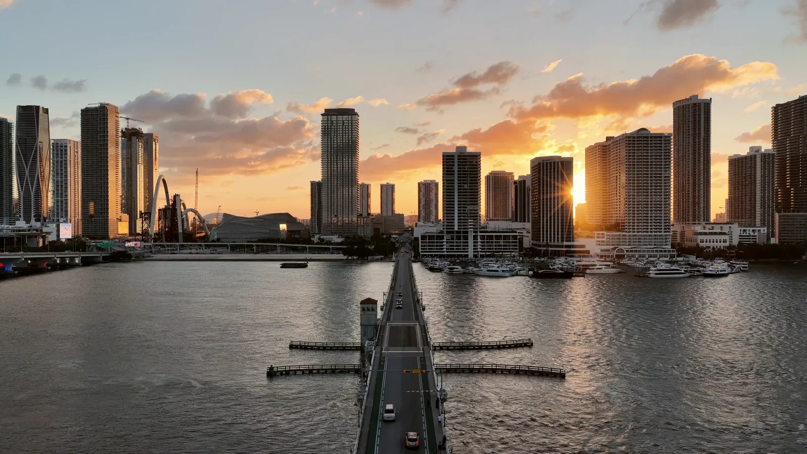 Miami towers over the bay at sunset
